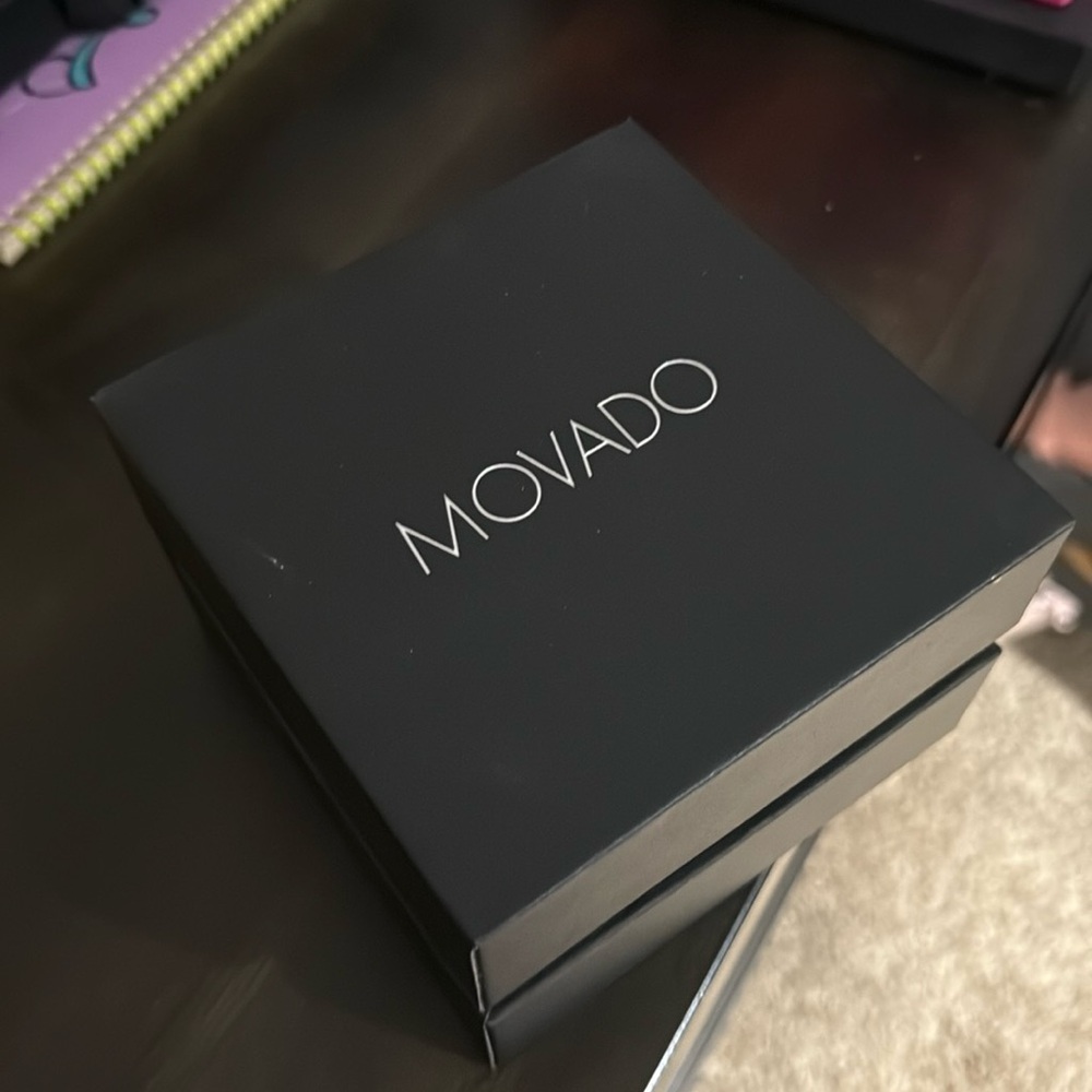 Movado Watch •
